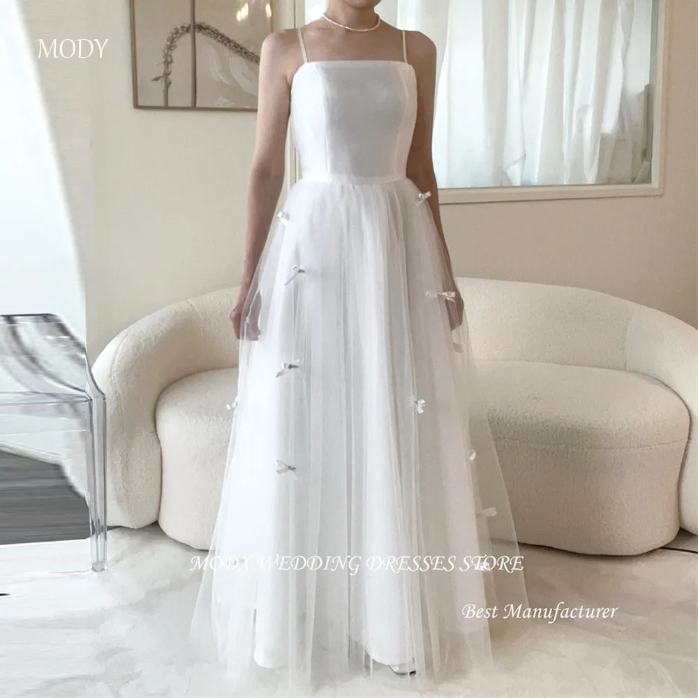 MODX Простые трапециевидные свадебные платья Корейская фотосессия на тонких бретельках из тюля длиной до пола, свадебные платья с корсетом сзади 2025
MODX Простые трапециевидные свадебные платья Корейская фотосессия на тонких бретельках из тюля длиной до пола, свадебные платья с корсетом сзади 2025