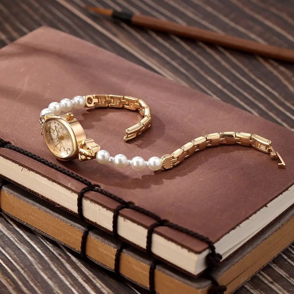 New Pearl Bracelet Watches Elegant Luxury Ladies Watch Gift Small Dial Design Quartz Watch
New Pearl Bracelet Watches Elegant Luxury Ladies Watch Gift Small Dial Design Quartz Watch