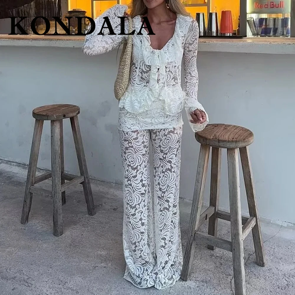 KONDALA Шикарный белый кружевной весенний женский костюм с v-образным вырезом, сексуальная блузка с расклешенными рукавами + брюки-клеш, модный повседневный комплект 2025 г. 
KONDALA Шикарный белый кружевной весенний женский костюм с v-образным вырезом, сексуальная блузка с расклешенными рукавами + брюки-клеш, модный повседневный комплект 2025 г.