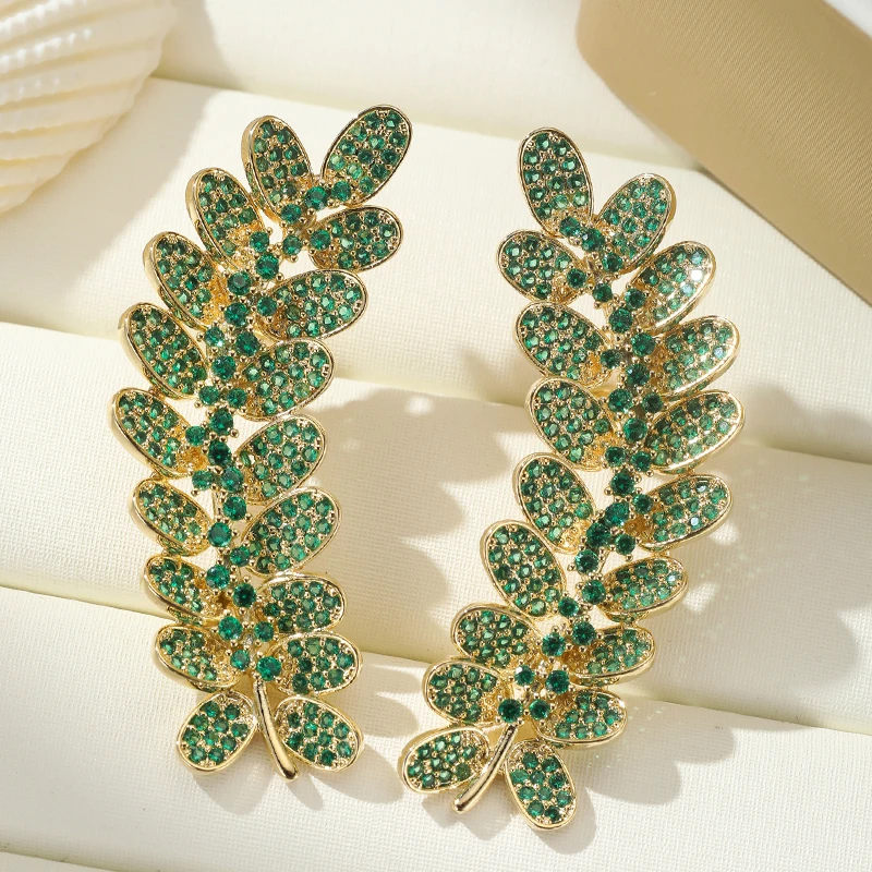 Роскошные серьги-манжеты с листьями золотого тона, сверкающие зеленые ботанические украшения с кубическим цирконием, элегантный аксессуар для вечеринок для женщин
Роскошные серьги-манжеты с листьями золотого тона, сверкающие зеленые ботанические украшения с кубическим цирконием, элегантный аксессуар для вечеринок для женщин