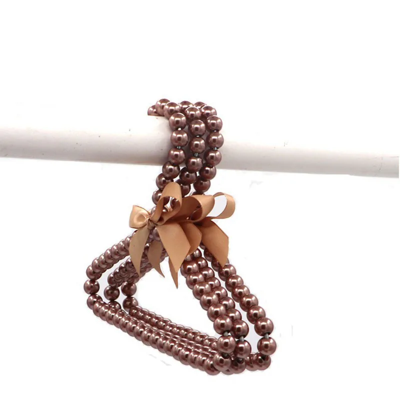 1PCS Pet Clothes Hangers Mini Pearl Hangers Pearl Baby Hangers Faux Pearl Beaded Elegant Garment Clothes Hangers with Ribbon
1PCS Pet Clothes Hangers Mini Pearl Hangers Pearl Baby Hangers Faux Pearl Beaded Elegant Garment Clothes Hangers with Ribbon