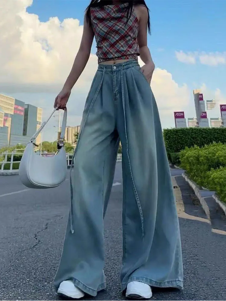 Женские винтажные широкие джинсы больших размеров, повседневные длинные тонкие свободные брюки с высокой талией и драпировкой длиной до пола
Женские винтажные широкие джинсы больших размеров, повседневные длинные тонкие свободные брюки с высокой талией и драпировкой длиной до пола