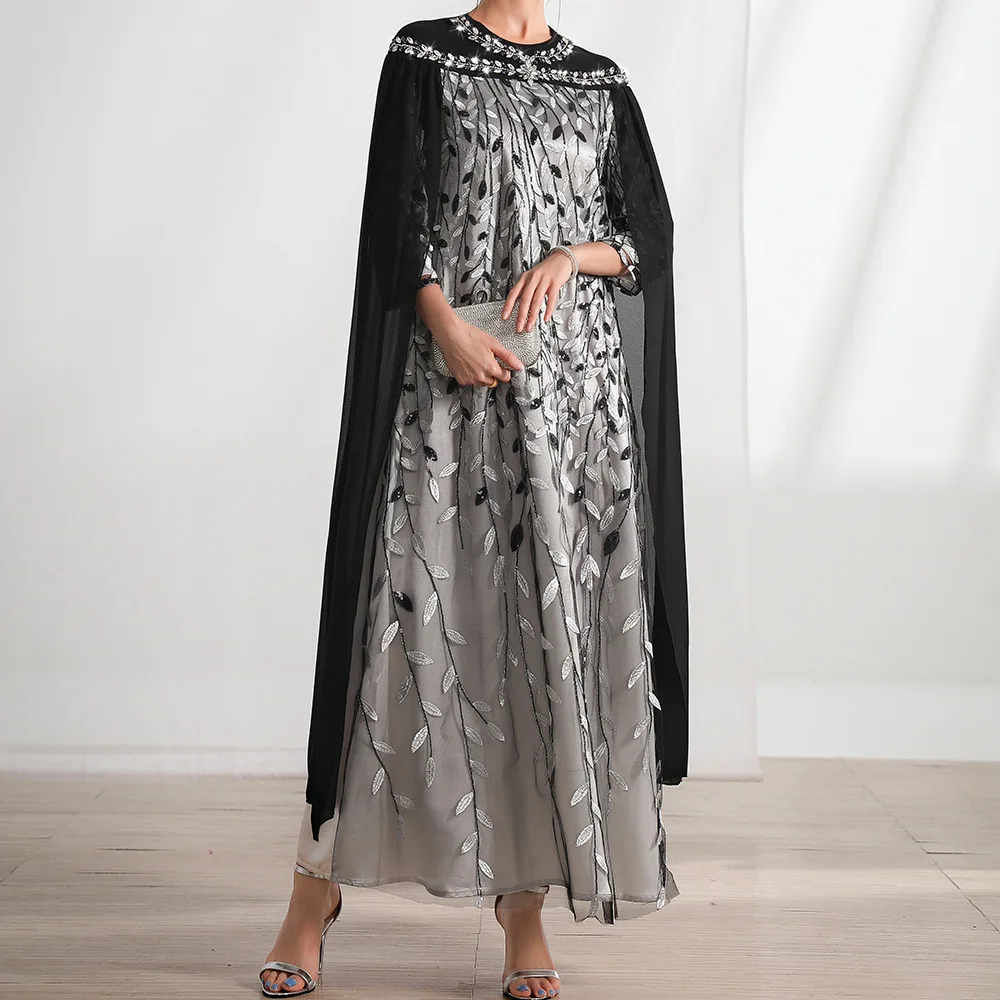 Black and white leaf mesh embroidery fashion cape fake two-piece dress Dubai lady long dress temperament classic luxury simple w
Black and white leaf mesh embroidery fashion cape fake two-piece dress Dubai lady long dress temperament classic luxury simple w