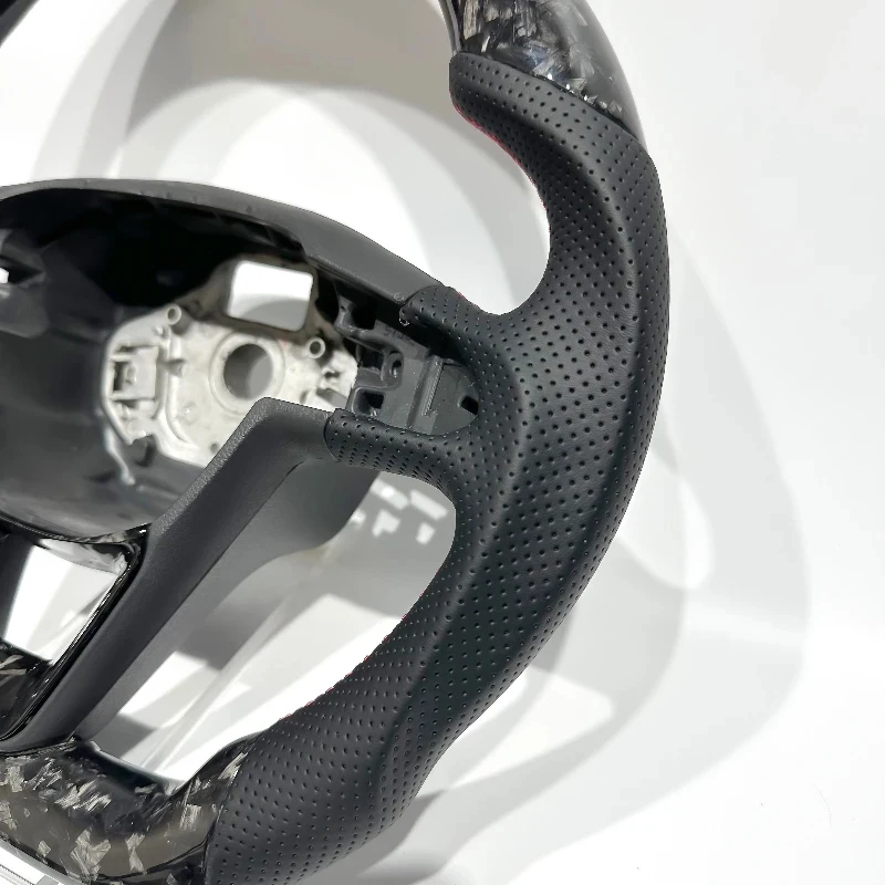Suitable Forged carbon fiber steering wheel Leon MK3
Suitable Forged carbon fiber steering wheel Leon MK3