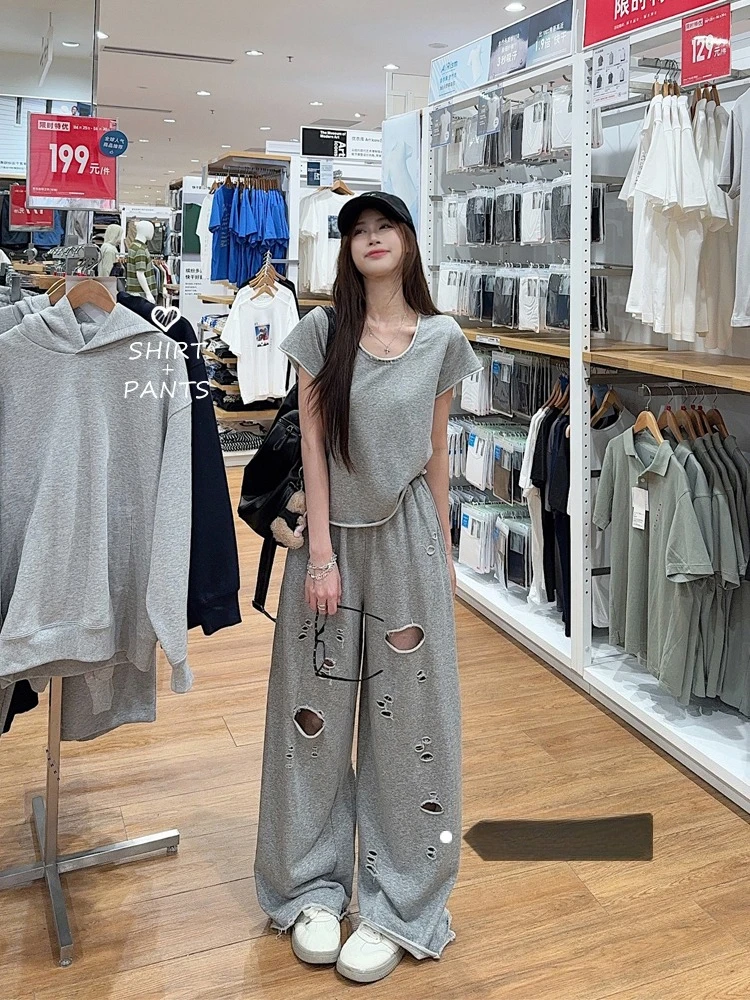Korean style rolled edge loose short sleeved T-shirt ripped hole wide leg casual pants women's 2025 summer new fashion set
Korean style rolled edge loose short sleeved T-shirt ripped hole wide leg casual pants women's 2025 summer new fashion set