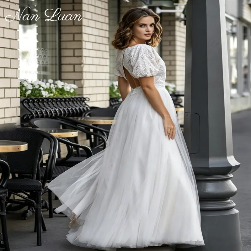 2026 Minimalist Lace Boat Neck Wedding Dress Puff Sleeve A-Line Bridal Gown Vestidos de Novia Customized
2026 Minimalist Lace Boat Neck Wedding Dress Puff Sleeve A-Line Bridal Gown Vestidos de Novia Customized