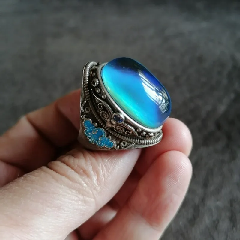 Vintage Tibetan Silver Ring with Patina, Inlaid Color Changing Gemstone, Adjustable Open Band
Vintage Tibetan Silver Ring with Patina, Inlaid Color Changing Gemstone, Adjustable Open Band