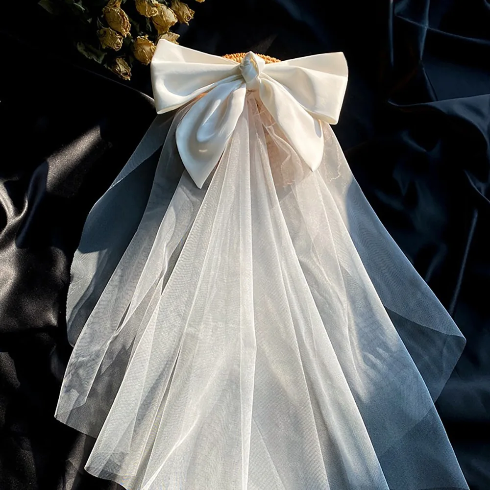 Изысканная многослойная свадебная фата из тюля, короткая белая фата с кружевом, жемчугом и бантом, заколка для волос, свадебное платье
Изысканная многослойная свадебная фата из тюля, короткая белая фата с кружевом, жемчугом и бантом, заколка для волос, свадебное платье