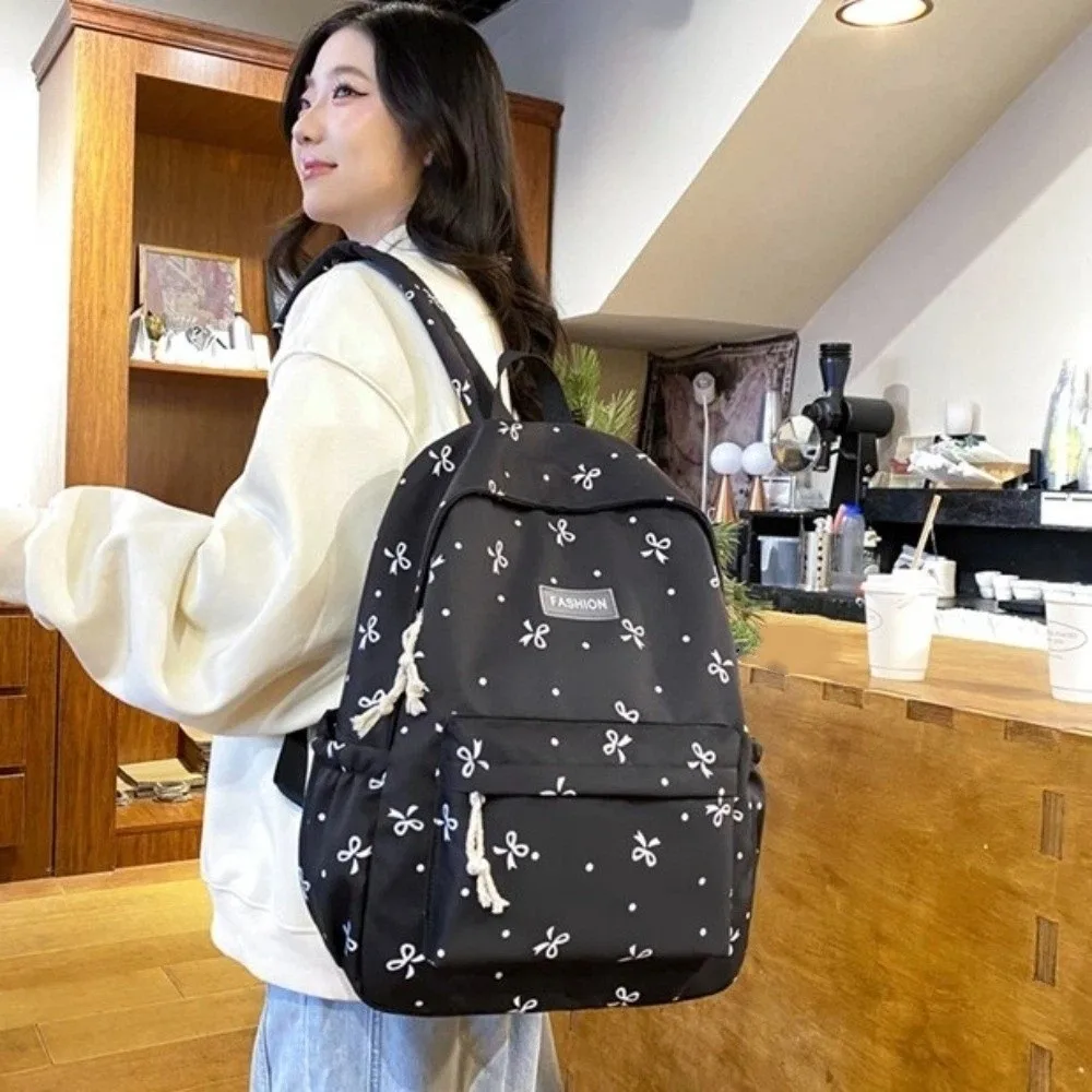 Nylon Material Bow Print Backpack Quilted Design Multi-Pocket Large Capacity School Bag Harajuku Reinforce Structure
Nylon Material Bow Print Backpack Quilted Design Multi-Pocket Large Capacity School Bag Harajuku Reinforce Structure