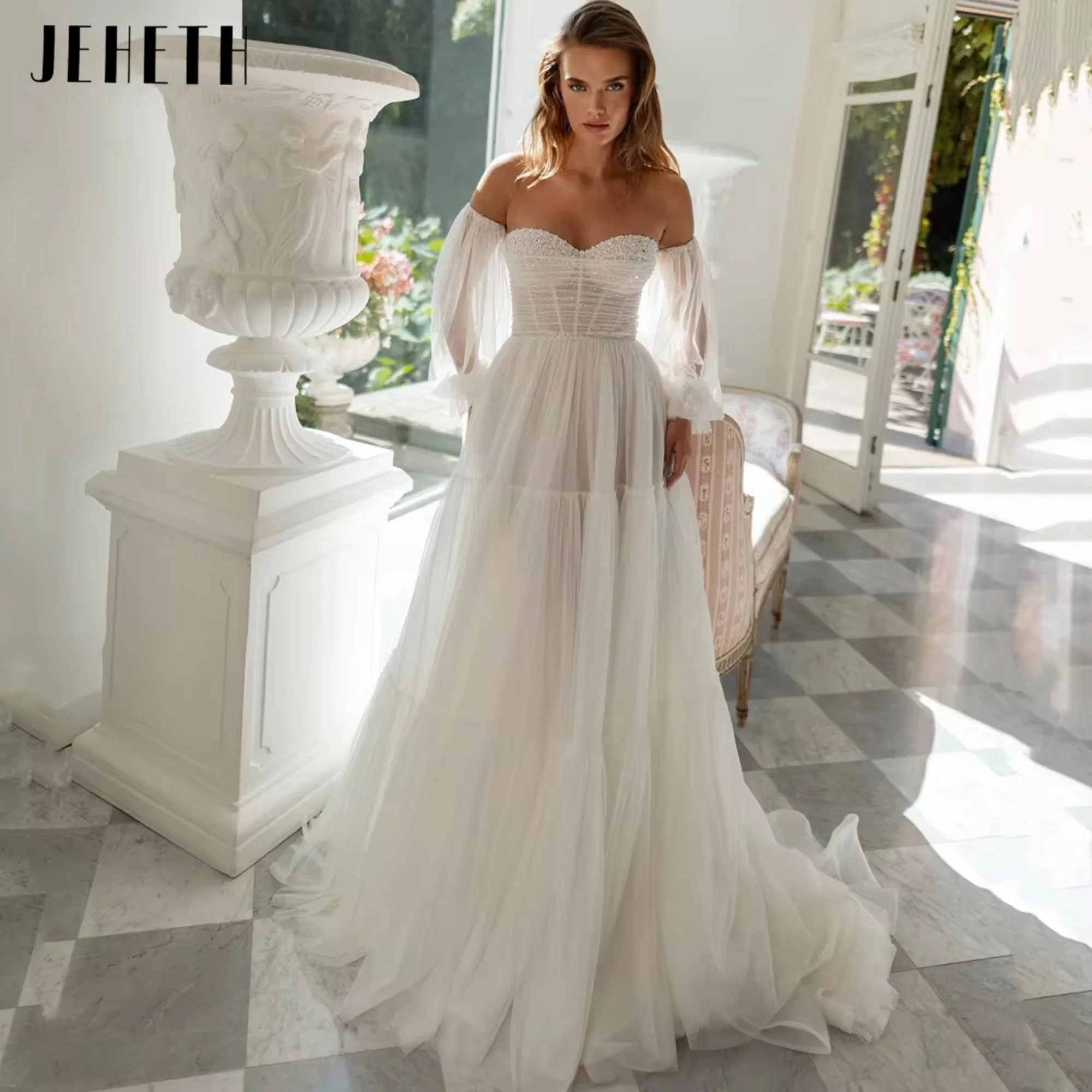 Elegant A Line Wedding Dresses Sweetheart Detachable Sleeve Pearl Bride Dress Tulle Lace Up Bridal Gowns New Vestidos Customized
Elegant A Line Wedding Dresses Sweetheart Detachable Sleeve Pearl Bride Dress Tulle Lace Up Bridal Gowns New Vestidos Customized