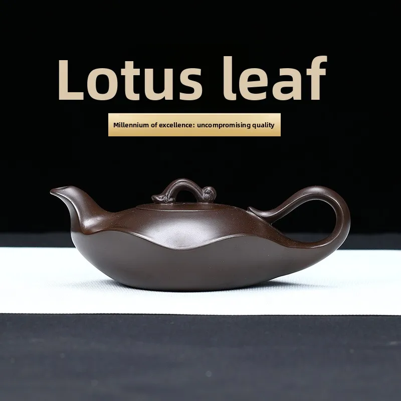 Чайник из исинской глины «Лотосовый лист» ручной работы, для заваривания чая Кунг-фу, из минеральной глины, изысканный подарок
Чайник из исинской глины «Лотосовый лист» ручной работы, для заваривания чая Кунг-фу, из минеральной глины, изысканный подарок