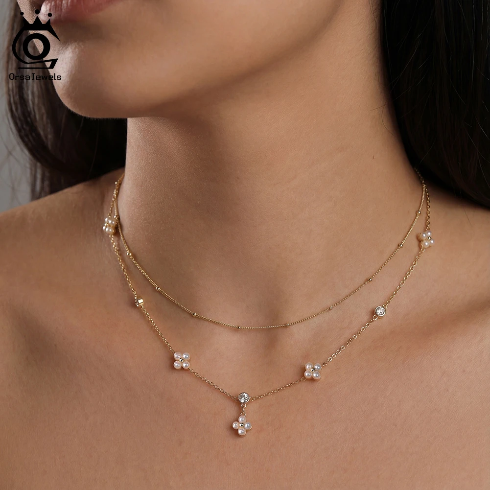 Ожерелье ORSA JEWELS из серебра S925 с 14-каратным золотом и жемчугом в форме клевера, украшенное натуральным жемчугом, для женщин, для свадьбы, вечеринки, банкета, подарок GPN100
Ожерелье ORSA JEWELS из серебра S925 с 14-каратным золотом и жемчугом в форме клевера, украшенное натуральным жемчугом, для женщин, для свадьбы, вечеринки, банкета, подарок GPN100