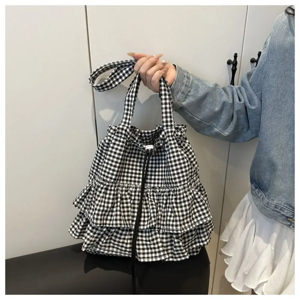 All-match Korean Style Lotus Leaf Shoulder Bag Fashion Large Capacity Plaid Tote Bag Cloth Portable Drawstring Bag Travel
All-match Korean Style Lotus Leaf Shoulder Bag Fashion Large Capacity Plaid Tote Bag Cloth Portable Drawstring Bag Travel
