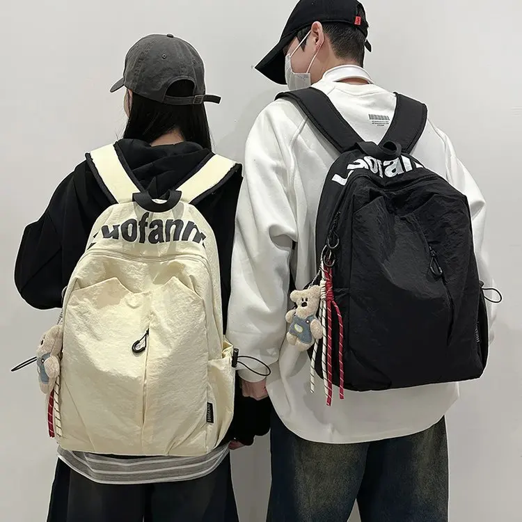 Minimalist Couple Backpack For Unisex Durable Casual Rucksack With Letter Print & Bear Charm Detail
Minimalist Couple Backpack For Unisex Durable Casual Rucksack With Letter Print & Bear Charm Detail