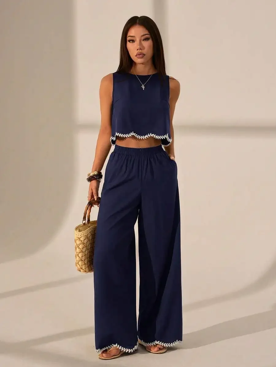 Womens Sleeveless Crop Top And Wide Leg Pants Set With Lace Trim Casual Vacation Outfit
Womens Sleeveless Crop Top And Wide Leg Pants Set With Lace Trim Casual Vacation Outfit