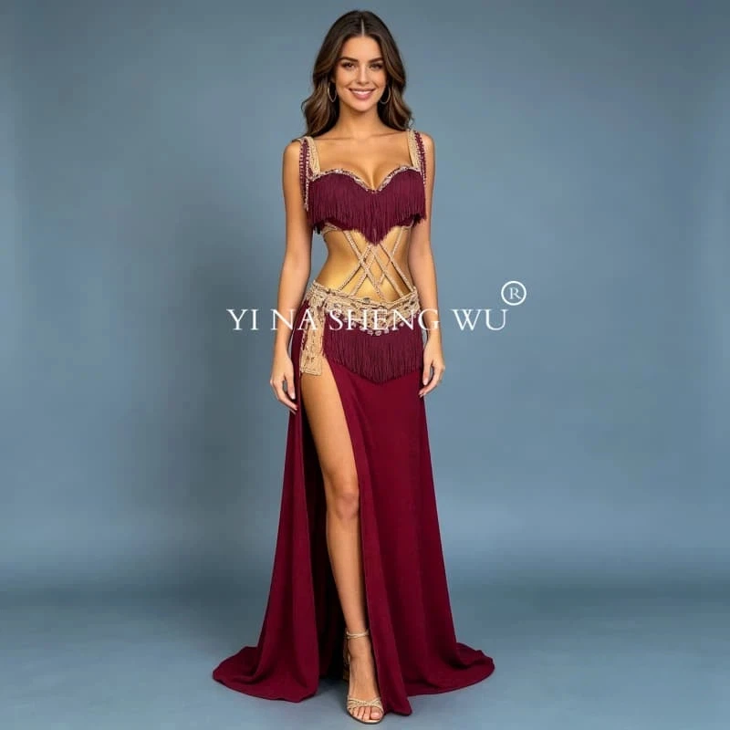 2026Burgundy Fringe Belly Dance Costume Professional Performance Rhinestone Bra Crisscross Waist Slit Long Skirt for Women
2026Burgundy Fringe Belly Dance Costume Professional Performance Rhinestone Bra Crisscross Waist Slit Long Skirt for Women