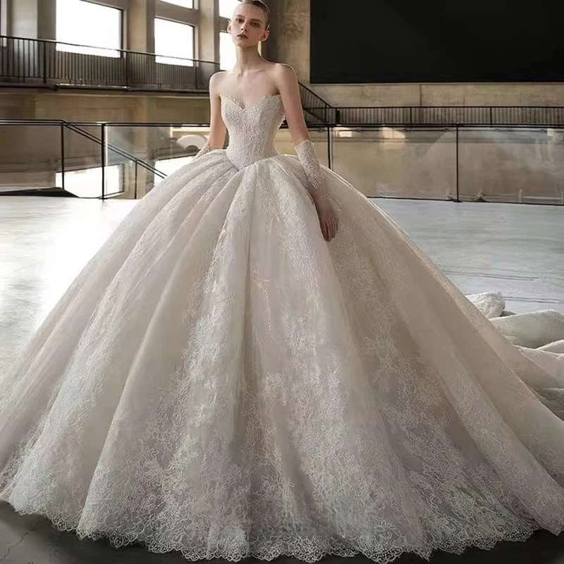New Lace Appliqué Wedding Dress Elegant Strapless Bandeau Wedding Dress A-Line Fluffy Princess Bridal Gowns for Church Weddings
New Lace Appliqué Wedding Dress Elegant Strapless Bandeau Wedding Dress A-Line Fluffy Princess Bridal Gowns for Church Weddings