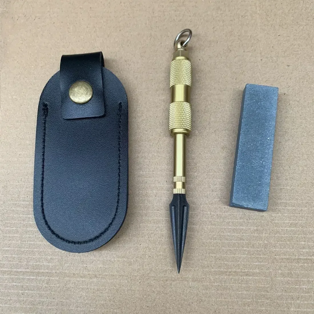 Hand Hardware Metal Cone Drilling Tools with PU Cover Outdoor Portable EDC Accessories Tools
Hand Hardware Metal Cone Drilling Tools with PU Cover Outdoor Portable EDC Accessories Tools