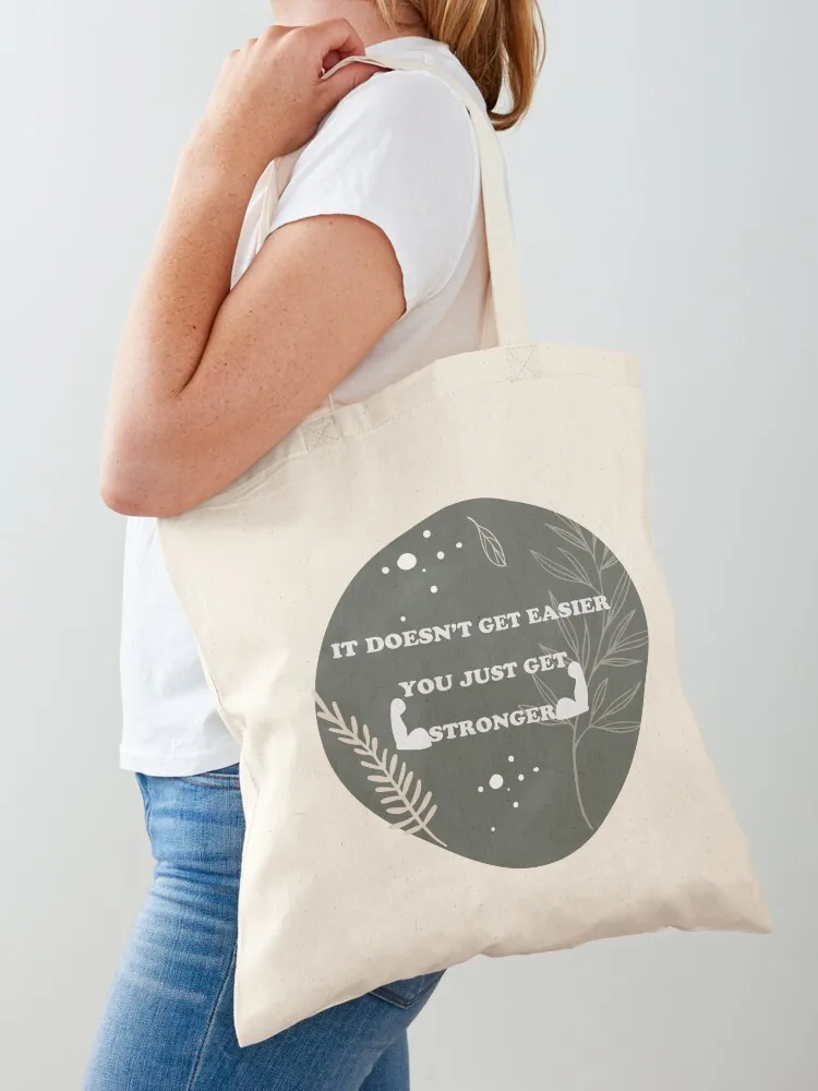 It Doesn't get easier You just get stronger : Awesome Gift For Gymers, Strong Women, Be Strong, Gift for her Tote Bag
It Doesn't get easier You just get stronger : Awesome Gift For Gymers, Strong Women, Be Strong, Gift for her Tote Bag