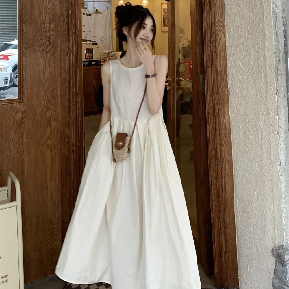 Women Round Neck Sleeveless A Line Midi Dress Loose Pleated Swing Long Dress with Side Pockets Solid White Sundress
Women Round Neck Sleeveless A Line Midi Dress Loose Pleated Swing Long Dress with Side Pockets Solid White Sundress