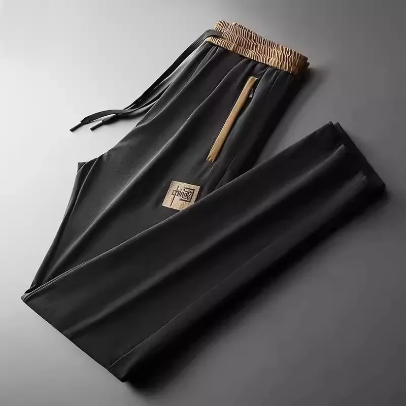 Ice Silk Thin Quick Dry Loose Straight Leg Pants Men's Summer Casual Sports Zipper Pocket Long Trousers Comfortable Breathable
Ice Silk Thin Quick Dry Loose Straight Leg Pants Men's Summer Casual Sports Zipper Pocket Long Trousers Comfortable Breathable