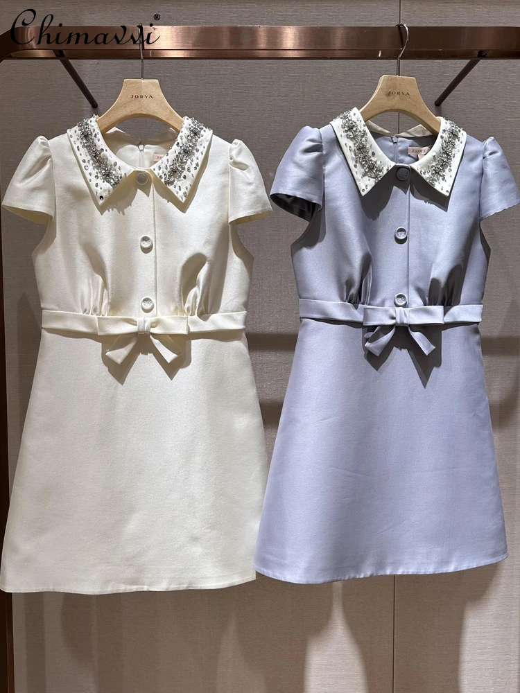 2025 Summer New French High-end Heavy Industry Bead Bow Short-sleeved Dress Women's Fashion Slim Temperament Party Dresses
2025 Summer New French High-end Heavy Industry Bead Bow Short-sleeved Dress Women's Fashion Slim Temperament Party Dresses