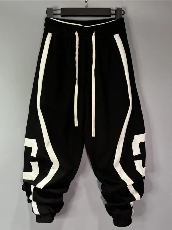 2026 designer's new plus-size stitching harem pants men's twill cotton loose high-elastic leg embroidery casual trousers.
2026 designer's new plus-size stitching harem pants men's twill cotton loose high-elastic leg embroidery casual trousers.