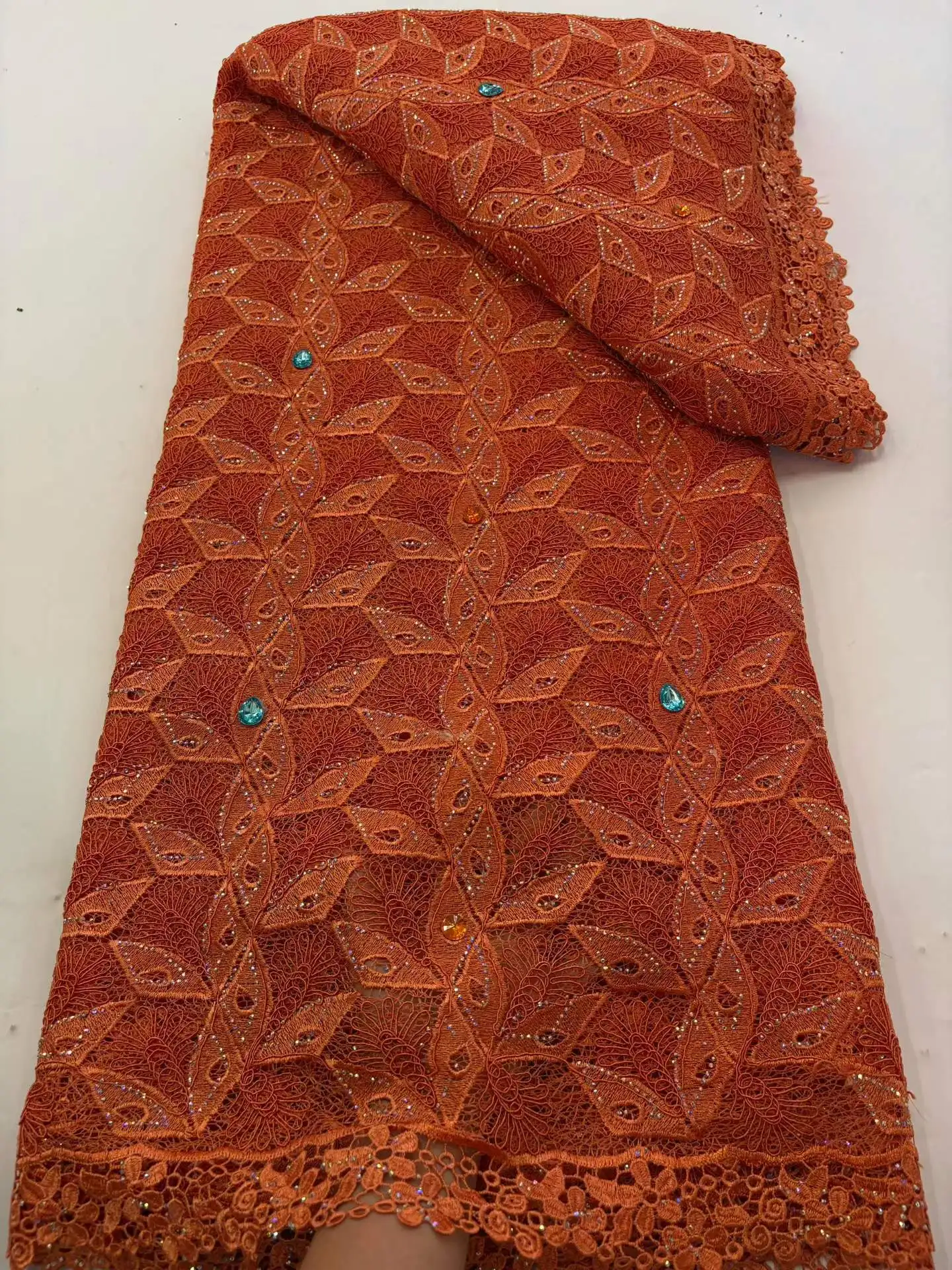 African Lace Fabric Nigerian High Quality Milk Silk Guipure Cord Lace for Party Dress Sewing 2026 Trendy Design
African Lace Fabric Nigerian High Quality Milk Silk Guipure Cord Lace for Party Dress Sewing 2026 Trendy Design