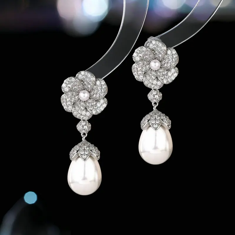 s925 Silver Needle French retro, niche and elegant earrings, teardrop-shaped pearl zircon flower fashionable earrings for women
s925 Silver Needle French retro, niche and elegant earrings, teardrop-shaped pearl zircon flower fashionable earrings for women