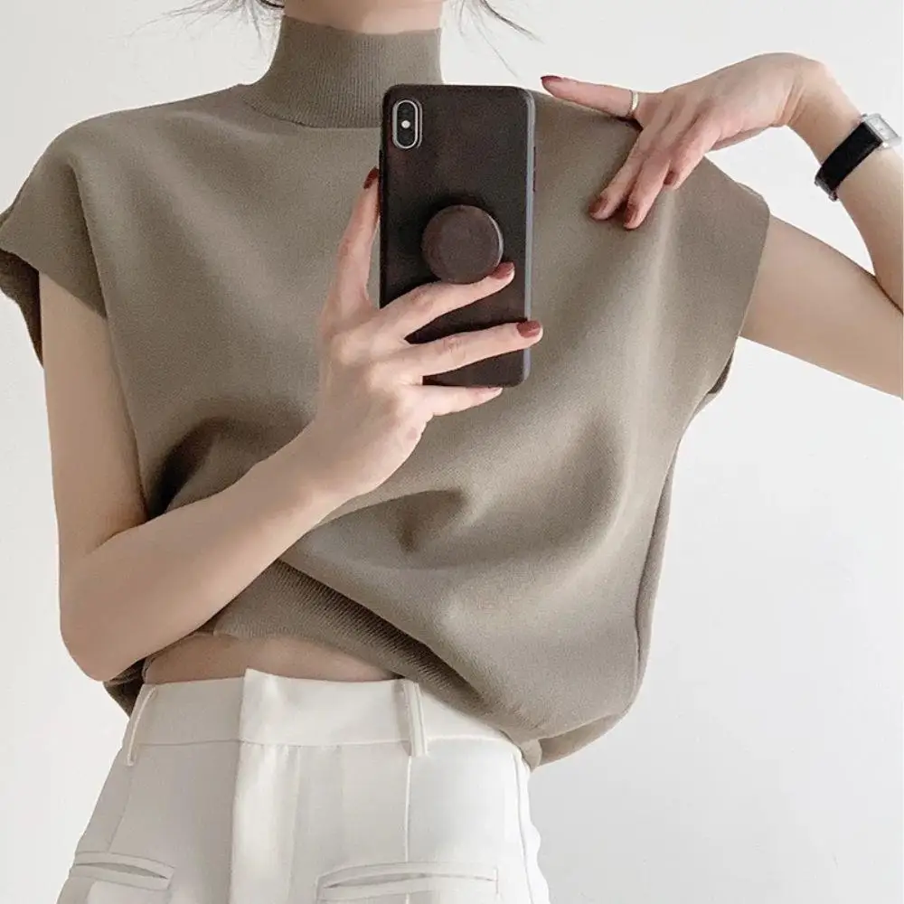 Solid Stand-up Collar Knitted Blouse Vest Short Sleeve Office Lady Women's Sweater Casual Shirt New Loose Straight Summer Tops
Solid Stand-up Collar Knitted Blouse Vest Short Sleeve Office Lady Women's Sweater Casual Shirt New Loose Straight Summer Tops