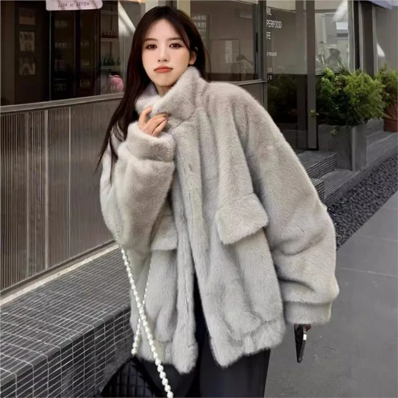 Mixed fur loose plush coat new women's beige stand-up collar large pocket furry top
Mixed fur loose plush coat new women's beige stand-up collar large pocket furry top