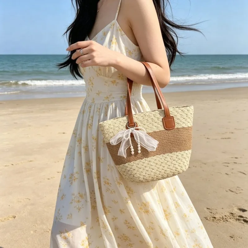 Summer Striped Straw Tote Bag with Leather Handle and Pearl Bow Multi-Color for Daily Use, Beach, Travel, and Outdoor Activities
Summer Striped Straw Tote Bag with Leather Handle and Pearl Bow Multi-Color for Daily Use, Beach, Travel, and Outdoor Activities