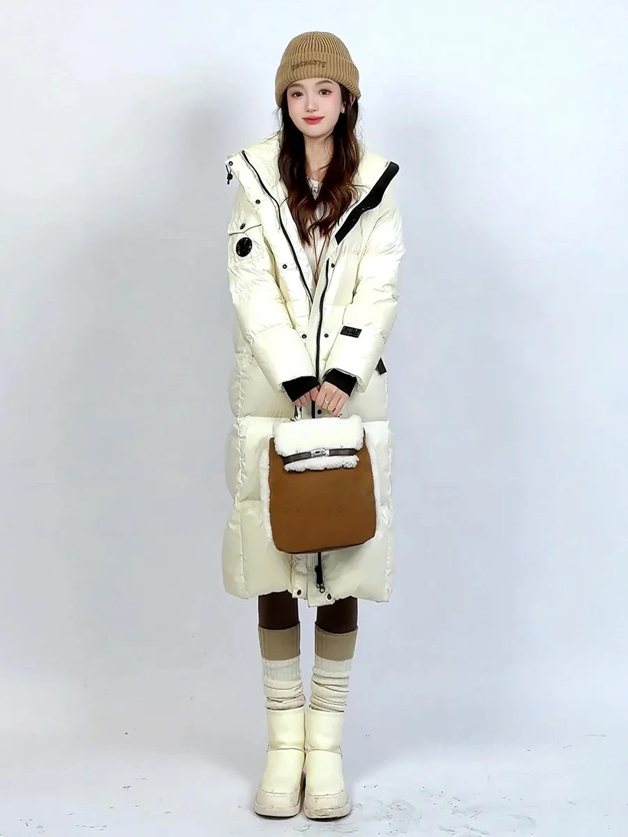 Ультратеплая длинная белая пуховая куртка-пуховик для женщин, зимнее пальто для экстремальных холодов, для поездок на работу, с капюшоном, модная женская модель
Ультратеплая длинная белая пуховая куртка-пуховик для женщин, зимнее пальто для экстремальных холодов, для поездок на работу, с капюшоном, модная женская модель