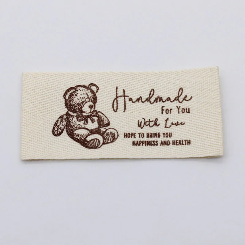 Handmade twill cotton fabric label handmade bag doll label printed with herringbone pattern cotton tape trademark collar label
Handmade twill cotton fabric label handmade bag doll label printed with herringbone pattern cotton tape trademark collar label