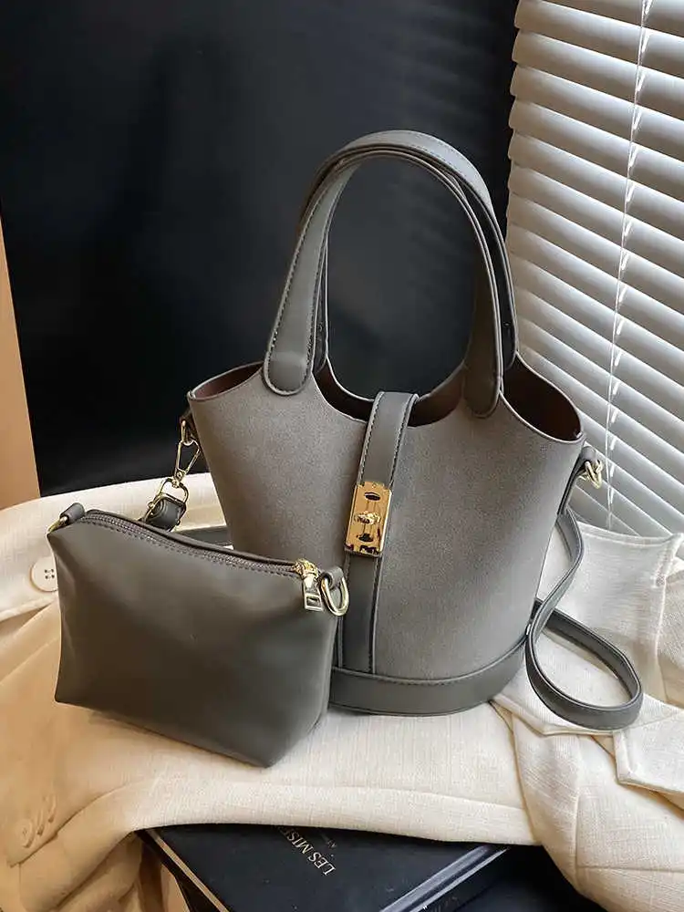 Korean Simple Handheld Bucket Bag 2024 New Versatile Commuter Shoulder Crossbody Bags Lady Casual Handbags
Korean Simple Handheld Bucket Bag 2024 New Versatile Commuter Shoulder Crossbody Bags Lady Casual Handbags