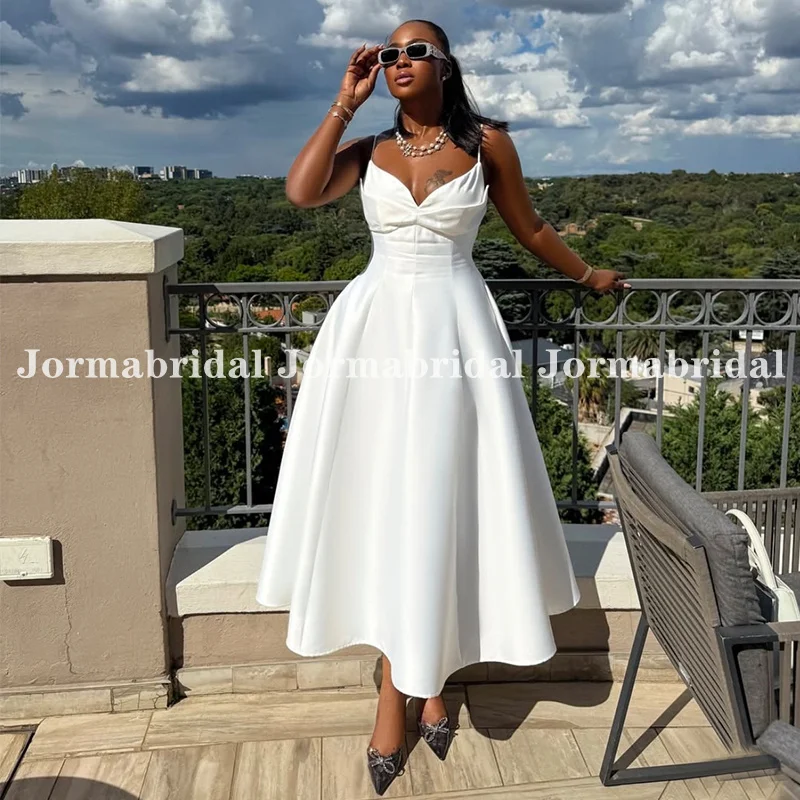 Женское свадебное платье на тонких бретельках без рукавов с v-образным вырезом белого цвета слоновой кости, трапециевидной формы до щиколотки, свадебные платья по индивидуальному заказу, платья de festa
Женское свадебное платье на тонких бретельках без рукавов с v-образным вырезом белого цвета слоновой кости, трапециевидной формы до щиколотки, свадебные платья по индивидуальному заказу, платья de festa