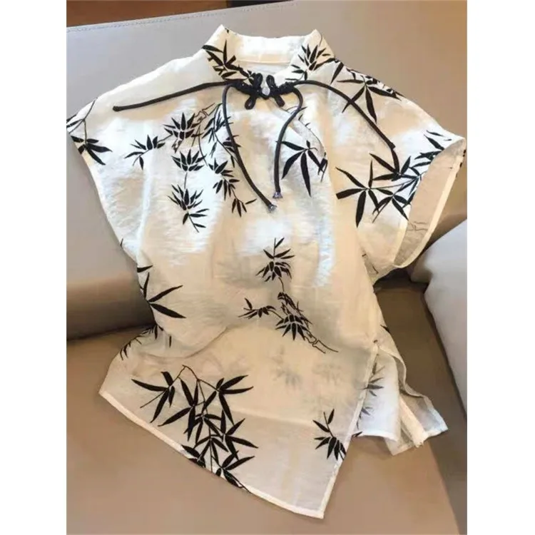 New Chinese Style Hollow Bamboo Leaf Embroidery Shirt Button Stand Collar Waist Cinching Retro Summer Short Top Women's Fashion
New Chinese Style Hollow Bamboo Leaf Embroidery Shirt Button Stand Collar Waist Cinching Retro Summer Short Top Women's Fashion