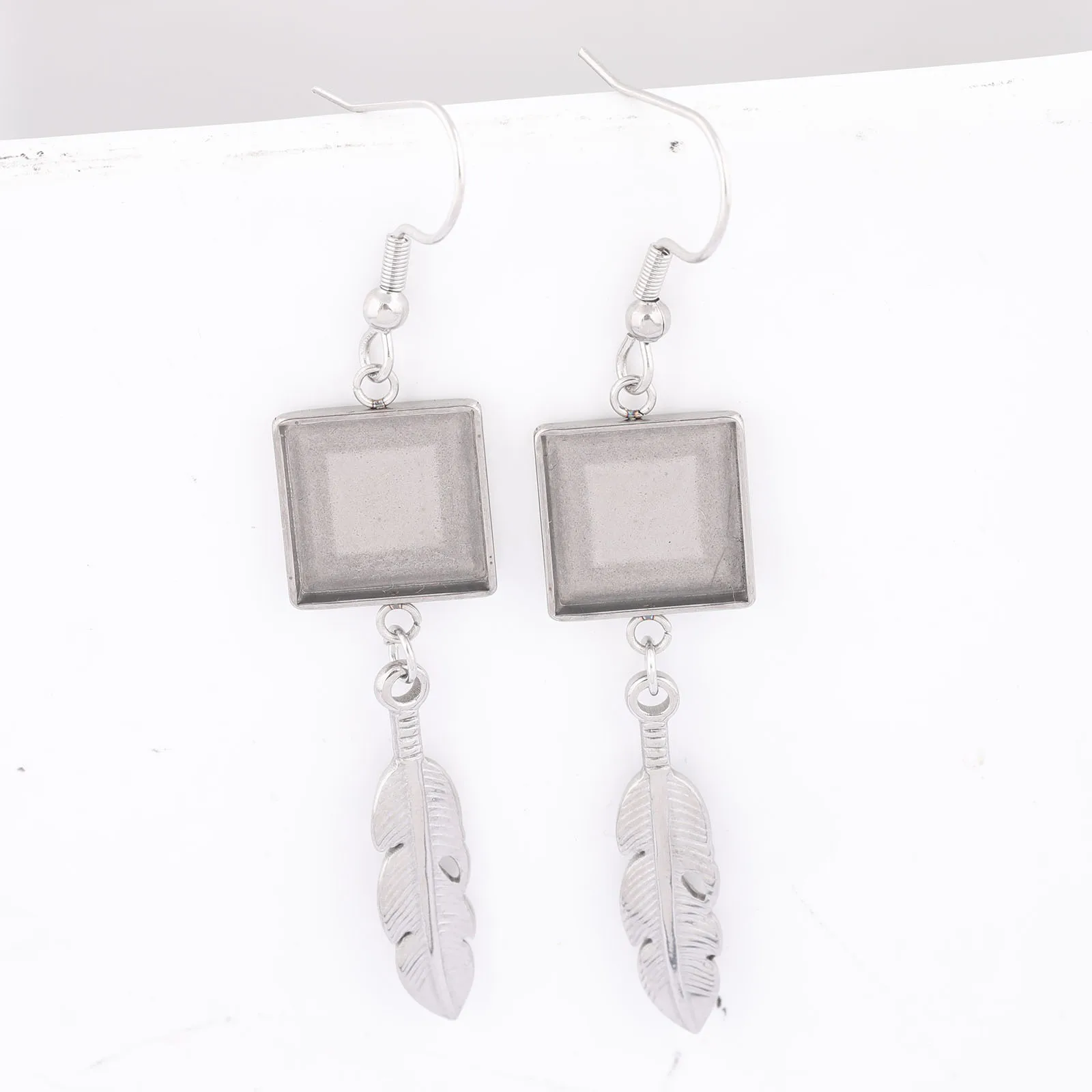 10pcs Stainless Steel 12mm Square Cabochon Earring Base Setting Blanks With Feather Charms Diy Hooks Ifndings For Jewelry Making
10pcs Stainless Steel 12mm Square Cabochon Earring Base Setting Blanks With Feather Charms Diy Hooks Ifndings For Jewelry Making