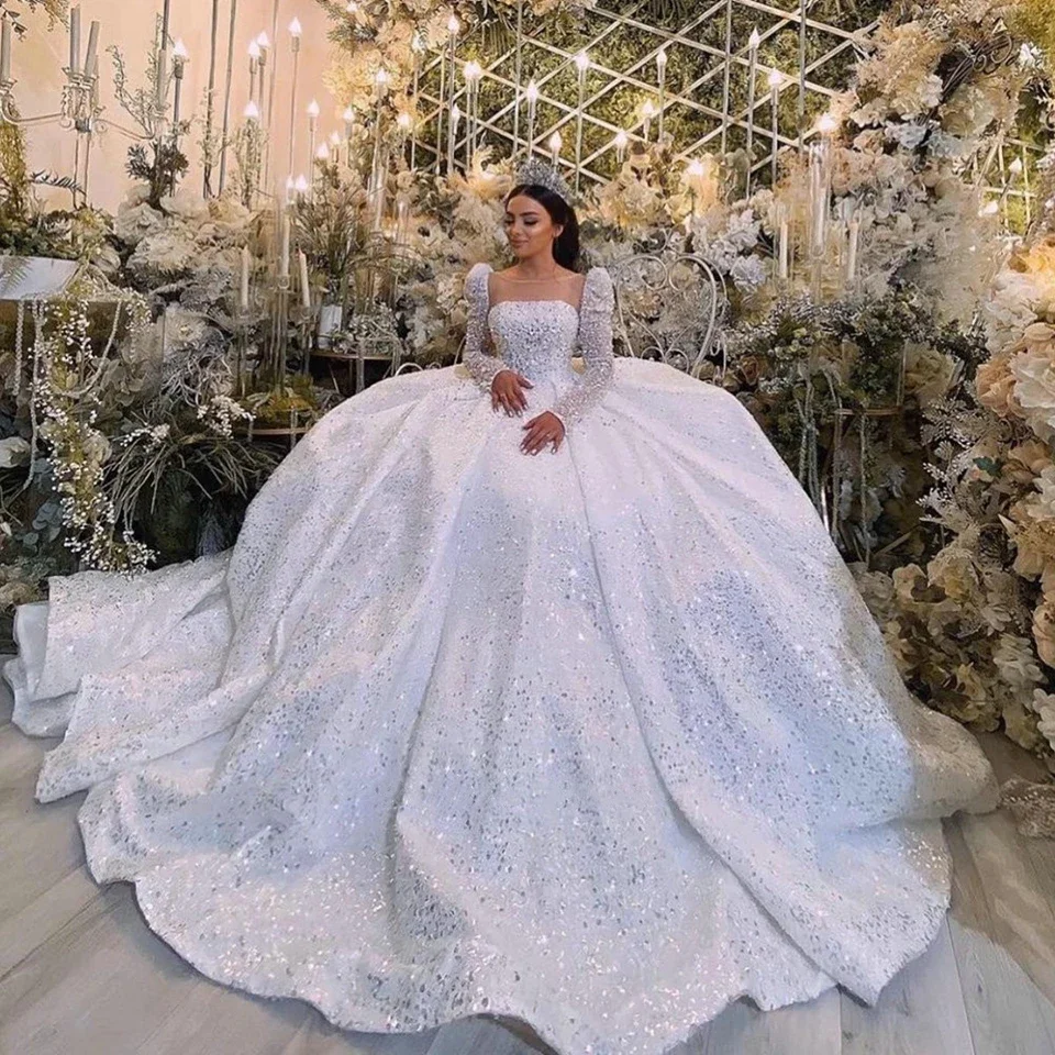 Flavinke Customized Princess Sequined Ball Gown Wedding Dresses 2025 Square Collar Illusion Dubai Bride Gowns Vestido De Noiva
Flavinke Customized Princess Sequined Ball Gown Wedding Dresses 2025 Square Collar Illusion Dubai Bride Gowns Vestido De Noiva