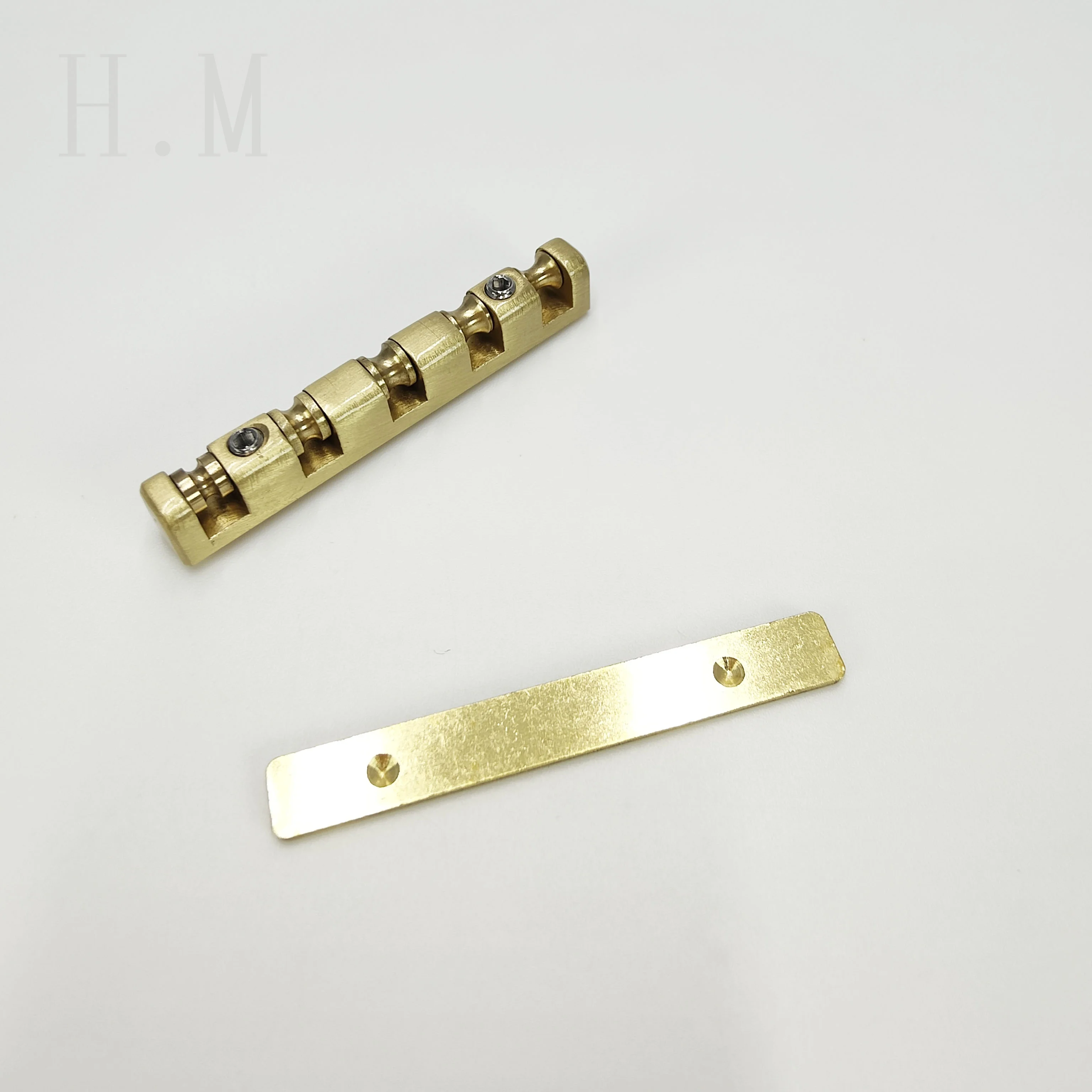 Full Copper ST Electric Guitar String Pillow Five String Electric Bass Ball Code Brass Pillow LP Adjustable Upper Pillow
Full Copper ST Electric Guitar String Pillow Five String Electric Bass Ball Code Brass Pillow LP Adjustable Upper Pillow