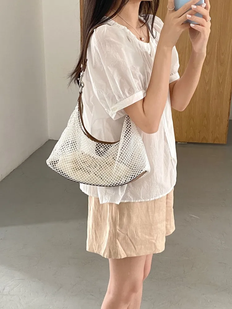 Hollow Woven Fishing Net Bags For Women Korean PU Splicing Design Mesh Shoulder Bag 2025 New Summer Fashion Beach Trend Handbags
Hollow Woven Fishing Net Bags For Women Korean PU Splicing Design Mesh Shoulder Bag 2025 New Summer Fashion Beach Trend Handbags