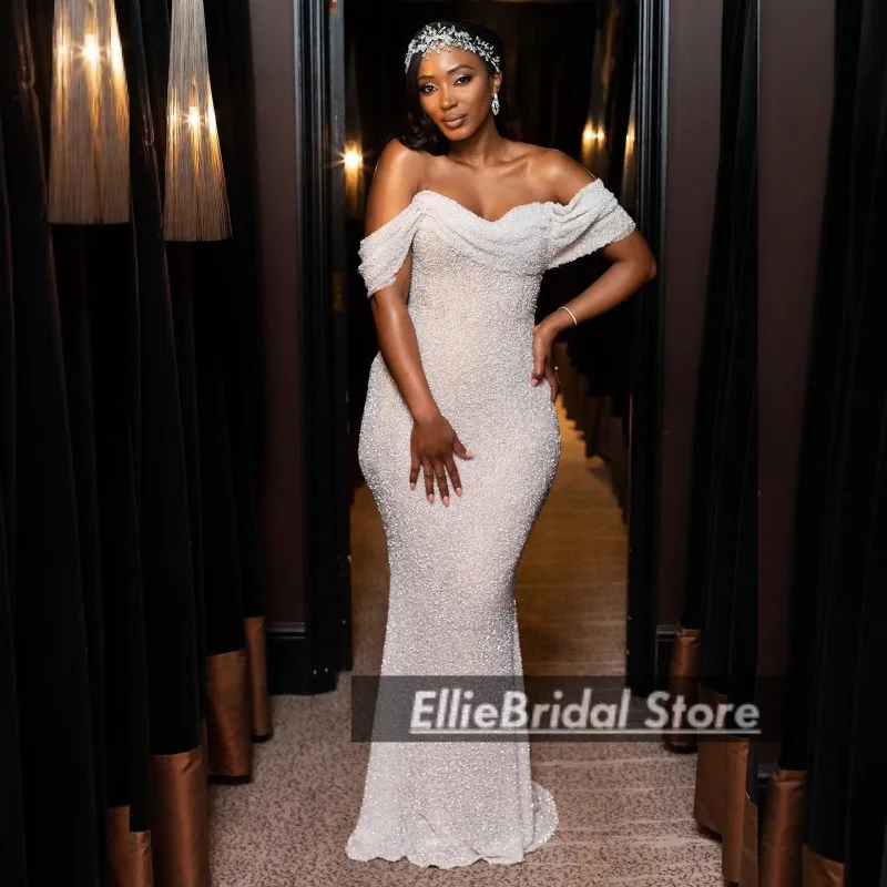 Luxury Pearls Wedding Dresses For Bride Off The Shoulder Mermaid Bridal Gowns Sweep Train Plus Size robe mariee Customized
Luxury Pearls Wedding Dresses For Bride Off The Shoulder Mermaid Bridal Gowns Sweep Train Plus Size robe mariee Customized