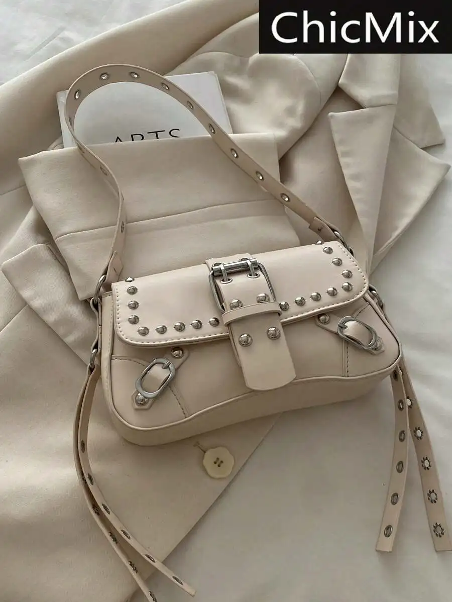 Cream Faux Leather Rivet Buckle Crossbody Bag with Adjustable Strap
Cream Faux Leather Rivet Buckle Crossbody Bag with Adjustable Strap