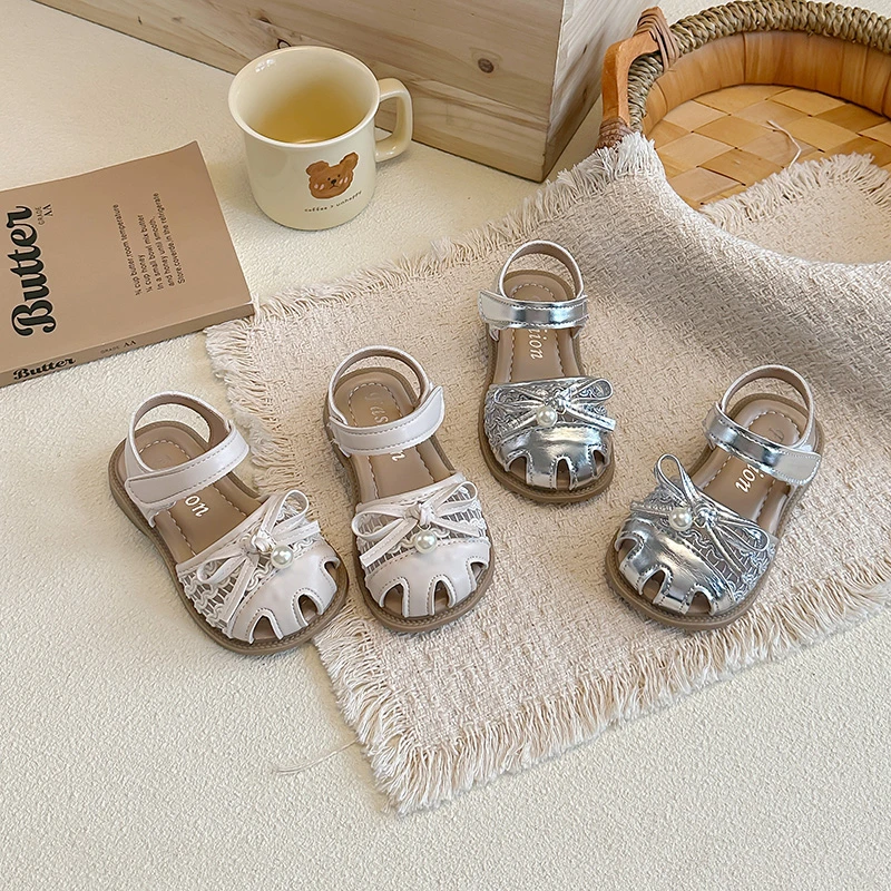 Kid's Shoes Girls' Princess Sandals Summer 2026 Hollow Breathable Bowknot Design Soft Soled Children's Shoes Korean Style 23-34
Kid's Shoes Girls' Princess Sandals Summer 2026 Hollow Breathable Bowknot Design Soft Soled Children's Shoes Korean Style 23-34