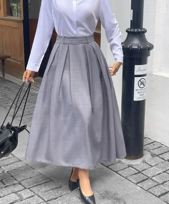 Юбка для женщин, весна-лето 2026, новая элегантная и модная однотонная повседневная длинная юбка с высокой талией и рюшами
Юбка для женщин, весна-лето 2026, новая элегантная и модная однотонная повседневная длинная юбка с высокой талией и рюшами