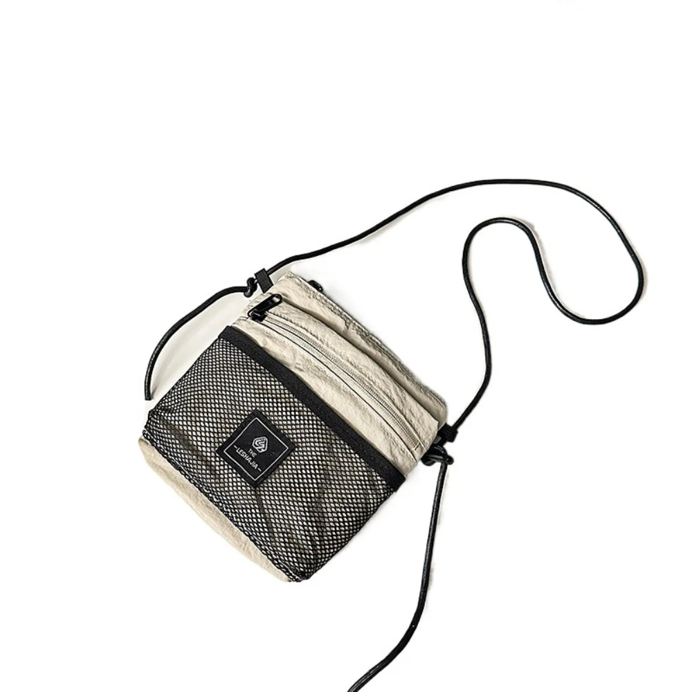 Multifunctional Crossbody Phone Pouch Mesh Korean Style Nylon Shoulder Bag Sports Handbag Small Square Bag Daily Matching
Multifunctional Crossbody Phone Pouch Mesh Korean Style Nylon Shoulder Bag Sports Handbag Small Square Bag Daily Matching