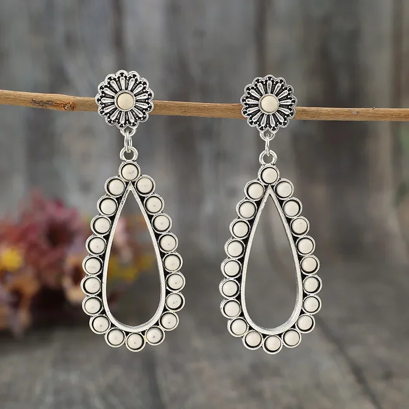 Western Style Retro Teardrop Turquoise Alloy Earrings, Charming Boho Ethnic Dangle Earrings with Silver-Tone Flower Stud and Open Teardrop Frame, Ideal for Women's Daily Wear, Party Occasions & Wholesale
Western Style Retro Teardrop Turquoise Alloy Earrings, Charming Boho Ethnic Dangle Earrings with Silver-Tone Flower Stud and Open Teardrop Frame, Ideal for Women's Daily Wear, Party Occasions & Wholesale