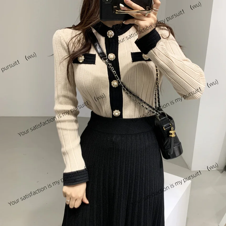 Элегантный легкий и зрелый женский тонкий и тонкий вязаный кардиган в тон, женский свитер + трикотажная юбка 
Элегантный легкий и зрелый женский тонкий и тонкий вязаный кардиган в тон, женский свитер + трикотажная юбка