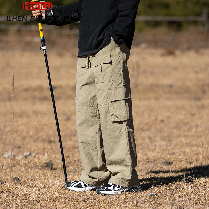 Men's Spring New Outdoor Multi Pocket Parachute Work Pants Men's Plus Size Waterproof Pants Street Hip Hop Casual Pants
Men's Spring New Outdoor Multi Pocket Parachute Work Pants Men's Plus Size Waterproof Pants Street Hip Hop Casual Pants