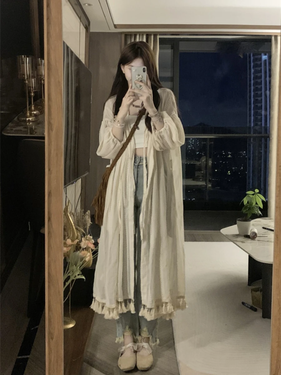 Женский открытый кардиган большого размера с бахромой, весна-осень, новая цельная тонкая верхняя одежда, свободная многослойная длинная юбка, защита от солнца...
Женский открытый кардиган большого размера с бахромой, весна-осень, новая цельная тонкая верхняя одежда, свободная многослойная длинная юбка, защита от солнца...